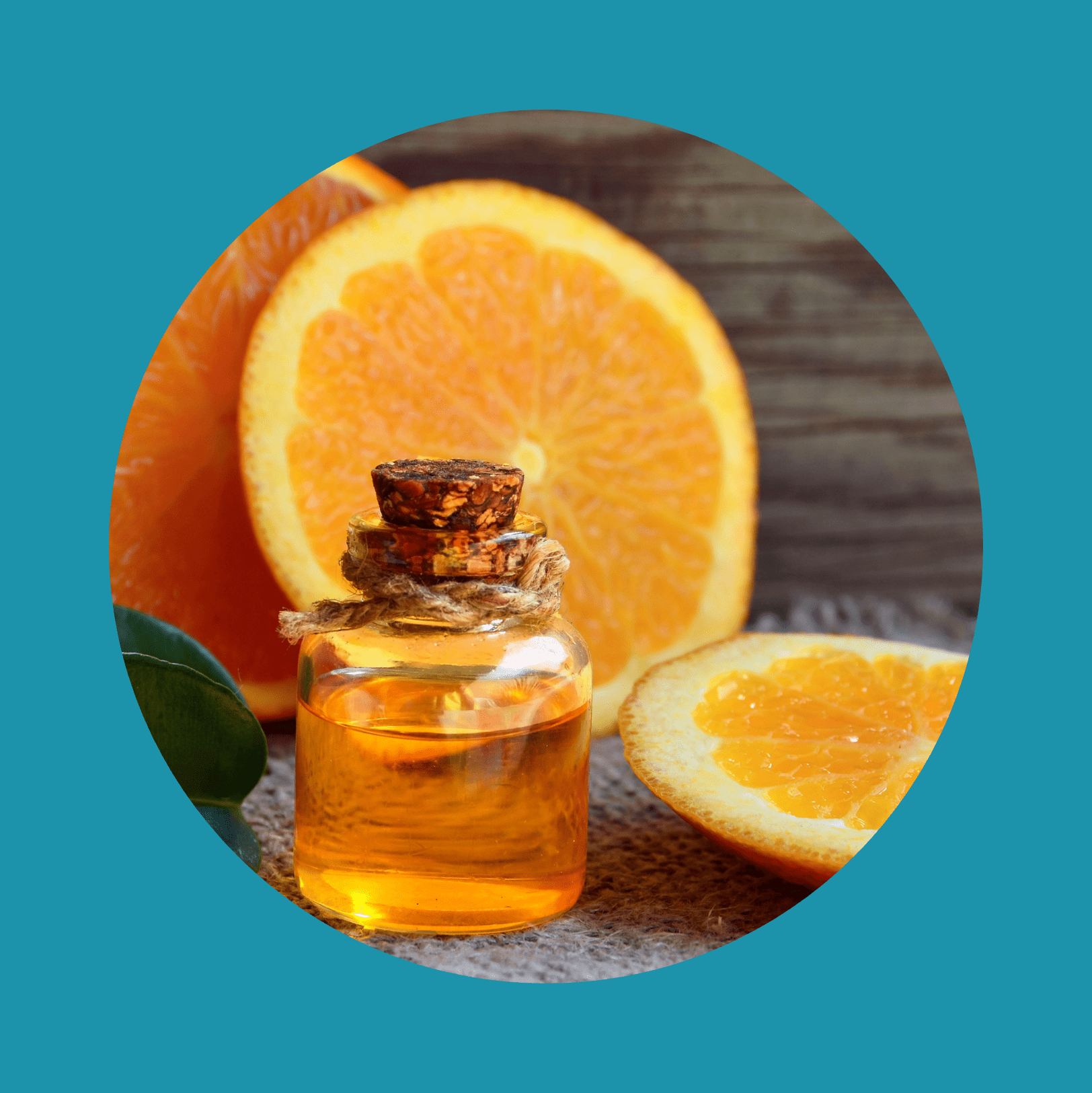 Orange essential oil in a glass bottle and fresh fruits on old wooden table.Citrus oil for skin care, spa, wellness, massage, aromatherapy and natural medicine.Selective focus.