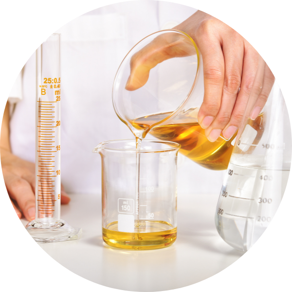 Team discussing new formulations in liquid manufacturing unit environment